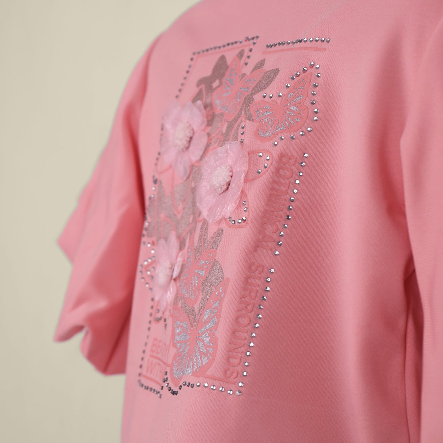 Shine bright in Naughty Girl’s top and skirt combo—appliqué, rhinestones, and festival flair!