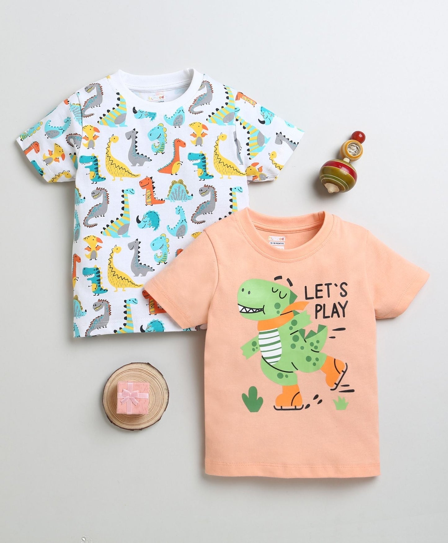 Double the fun with Bumzee’s boys’ 2-pack tees—soft cotton, bright colors, and “Let’s Play”!