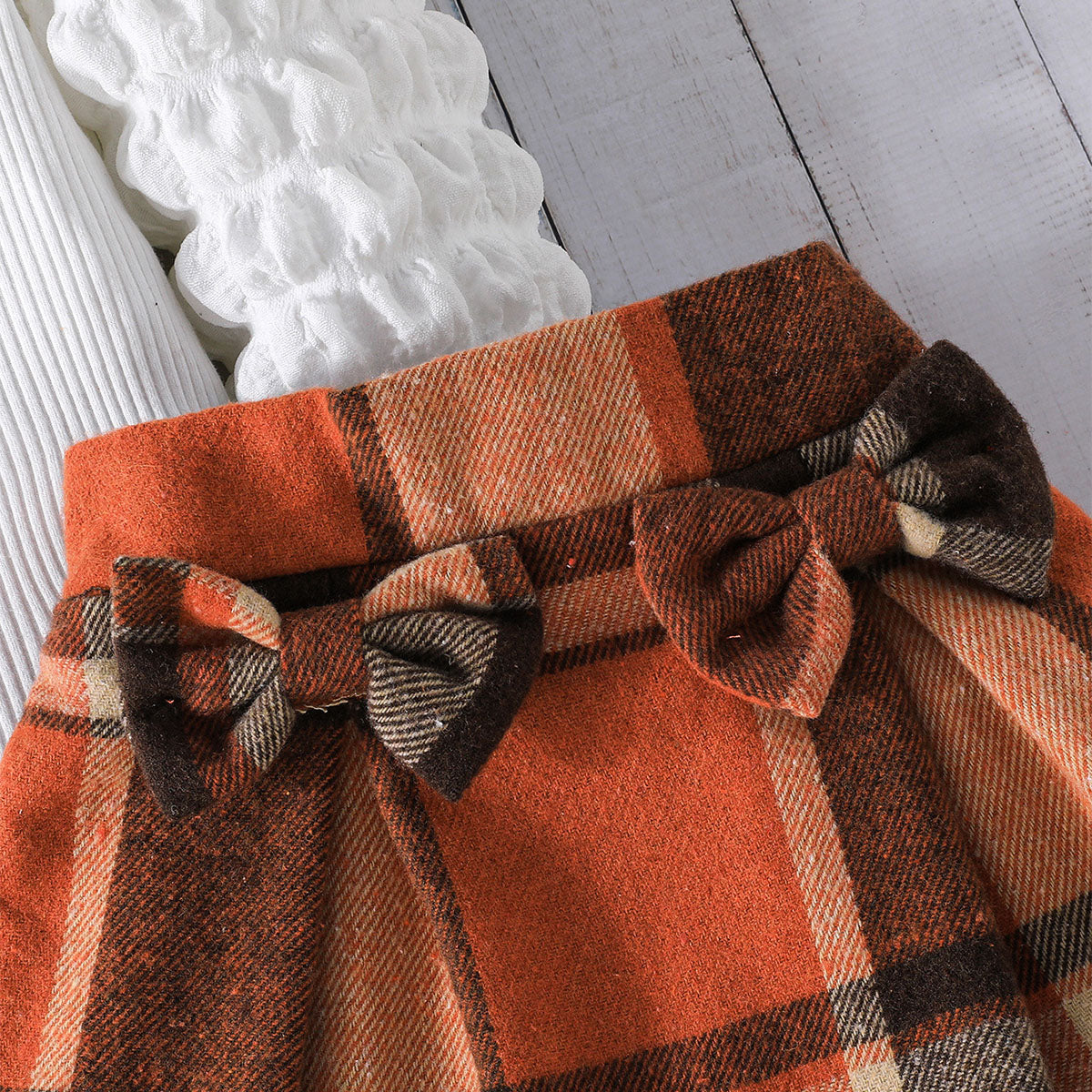 Girls Puff Sleeves Top With Multicolor
Checked Skirt Set