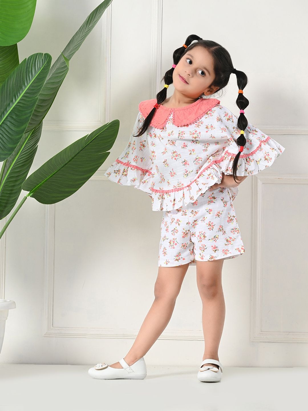 All-Season Chic: White All Over Prints Top and Back Elastic Shorts Duo