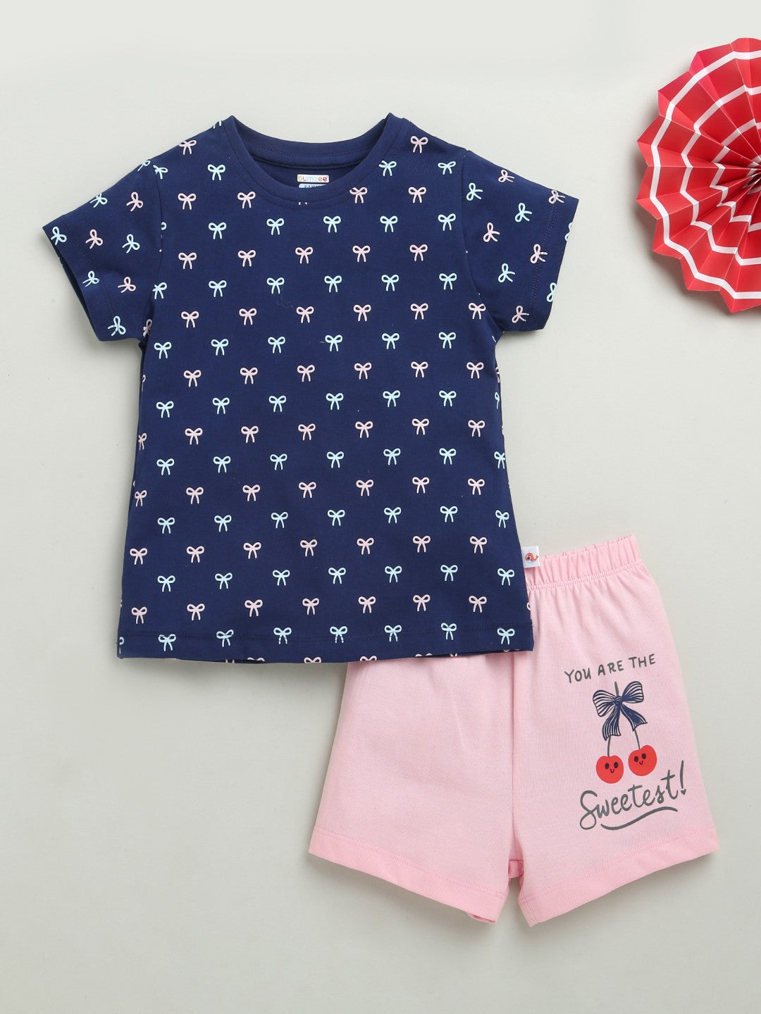 Slip into cozy style with Bumzee’s T-shirt & shorts set—playful text and comfy fit!