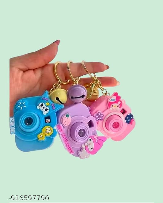 Mini Camera Keychain with Bell Charm – Cute Silicone Bag Charm & Key Ring, Pack of 1, Colour & Design May Vary