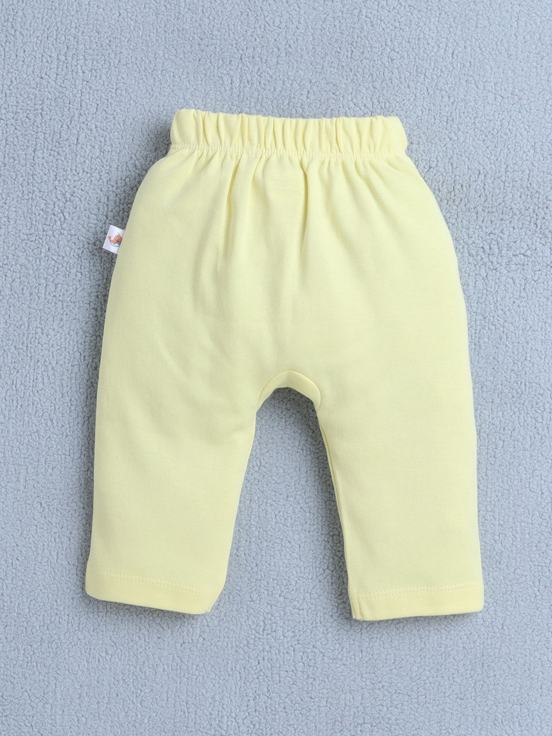 Slip into comfort with Bumzee’s all-over print diaper pants—perfect for warm weather play!