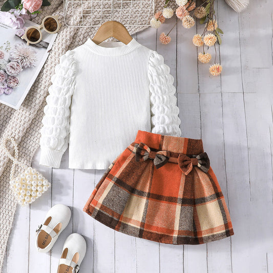 Girls Puff Sleeves Top With Multicolor
 
 Checked Skirt Set
