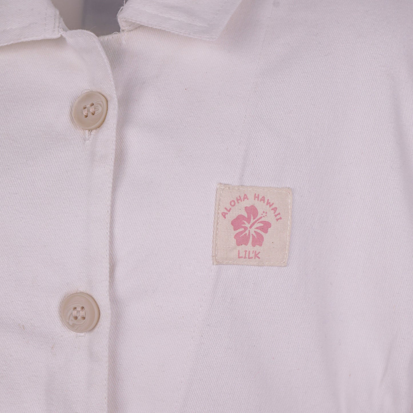 Breezy Comfort: Little Kangaroos Soft White Jumpsuit with Front Buttons