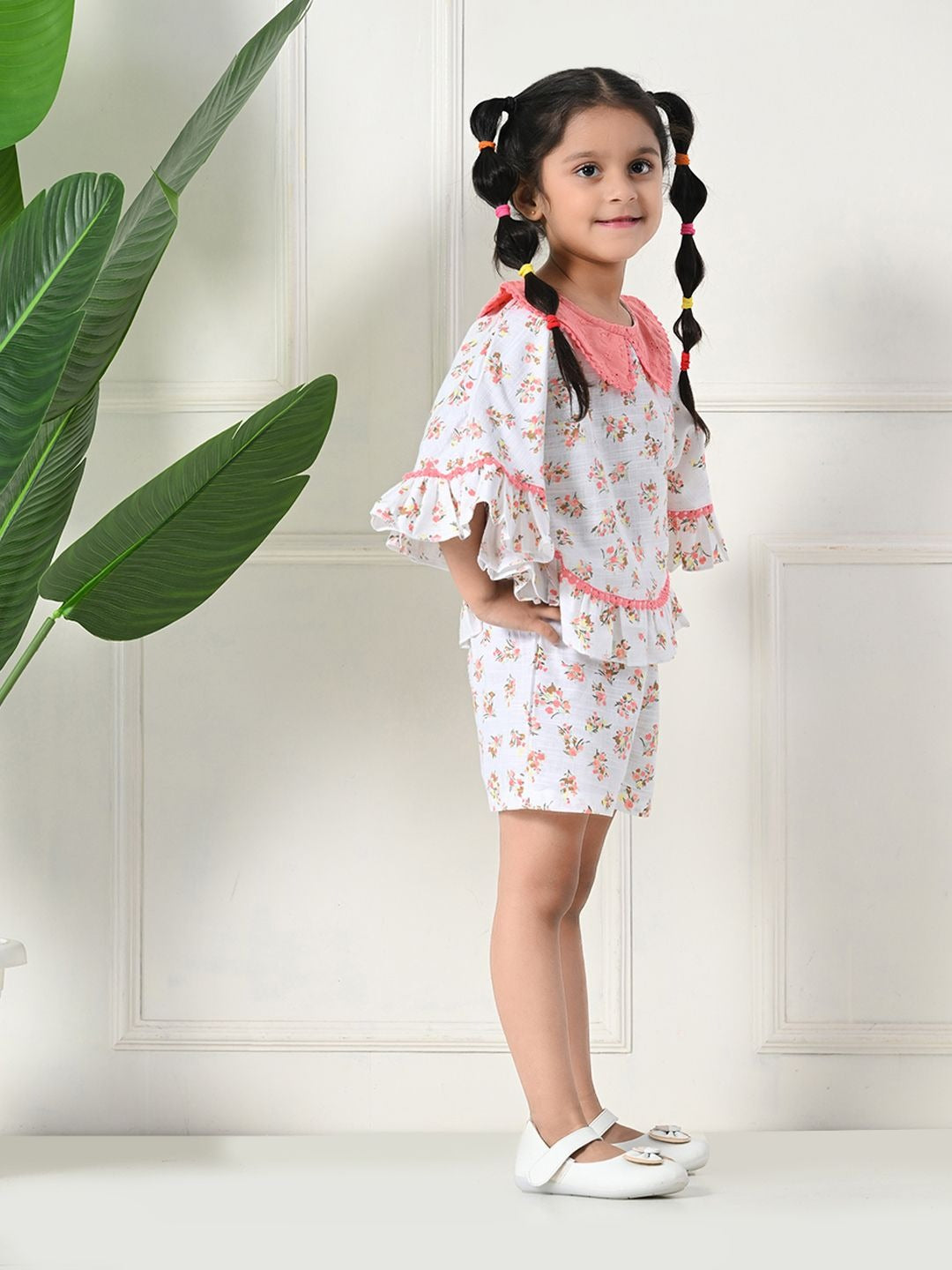 All-Season Chic: White All Over Prints Top and Back Elastic Shorts Duo
