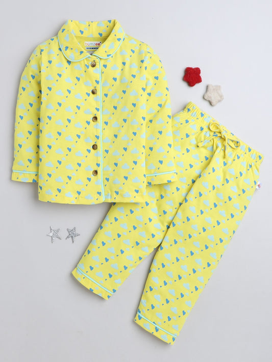 Slip into style and comfort with Bumzee’s yellow all-over print shirt & pyjama combo!