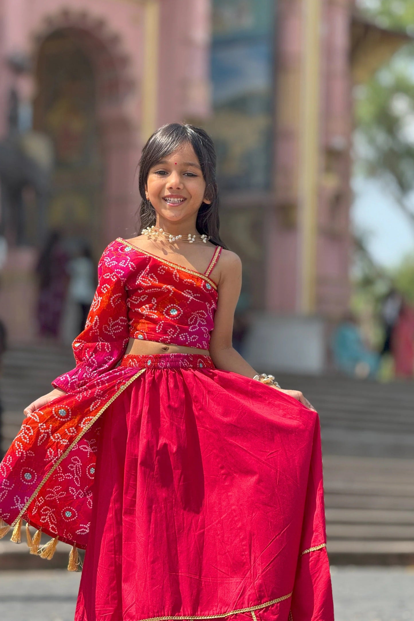 Little Festive Spark: Peekaaboo Red Print Choli & Full Skirt Set for Outdoor Twirls