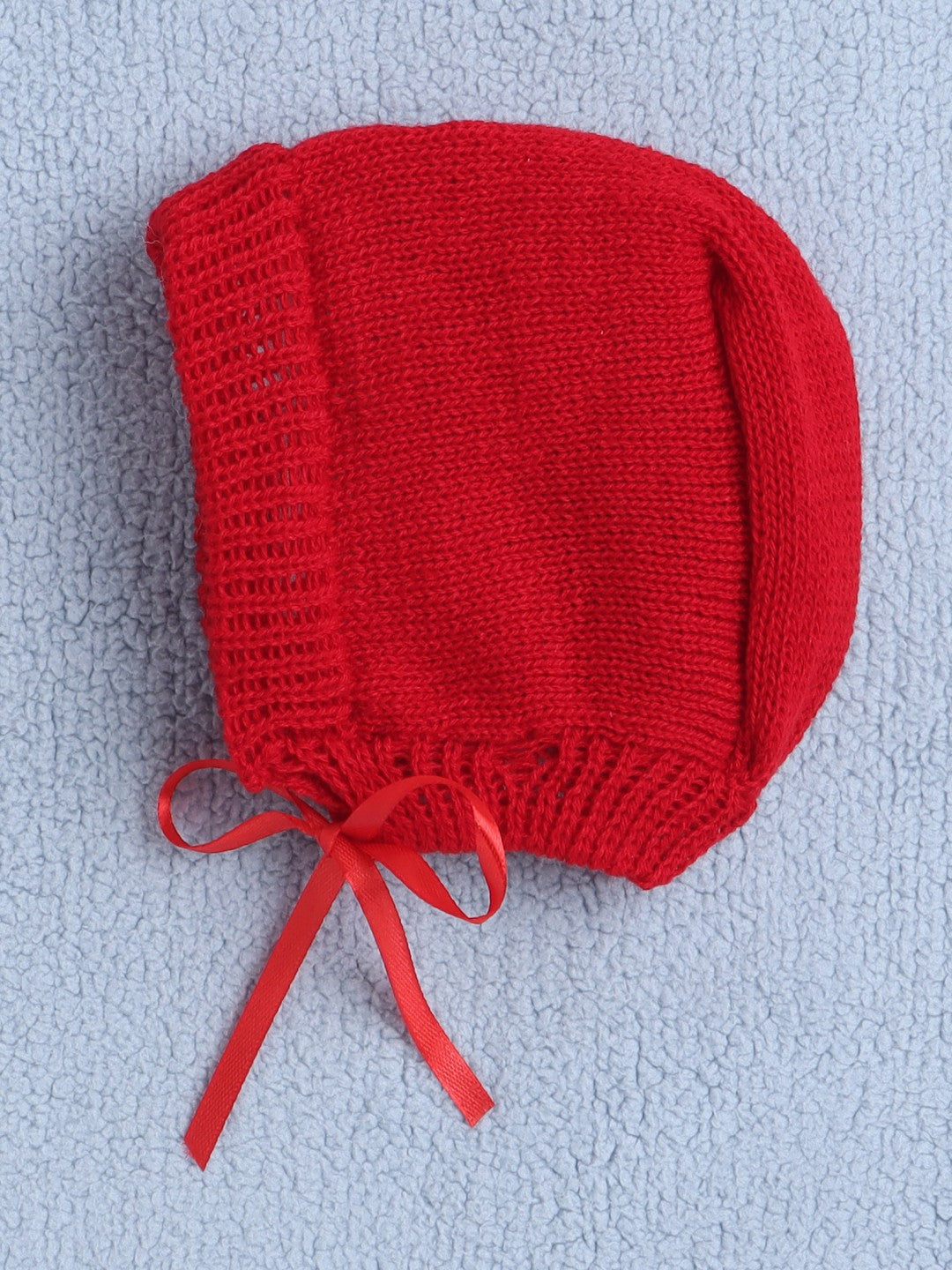 Bumzee’s unisex red sweater set: pure wool warmth with cap and socks for chilly days!