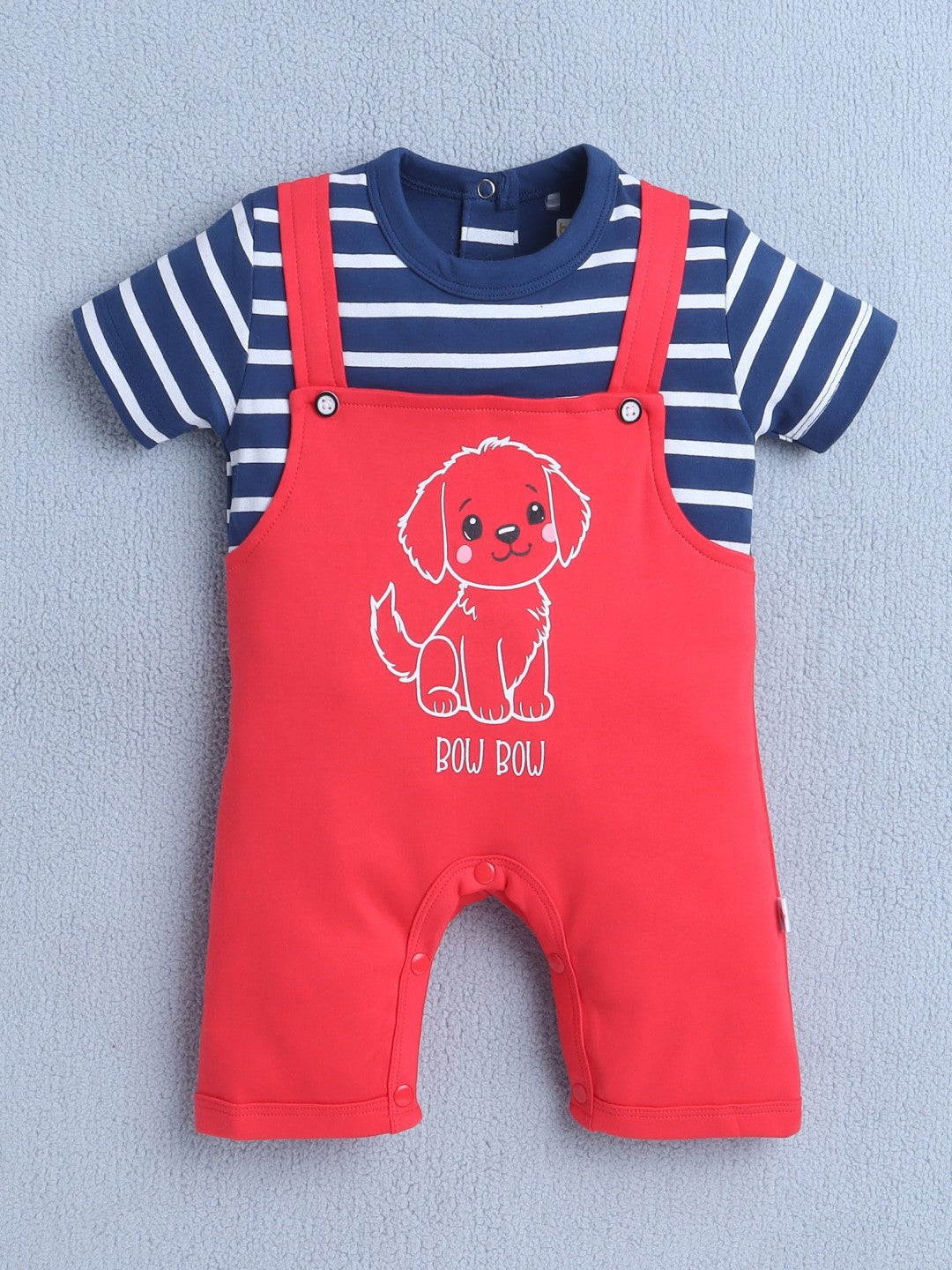 Playful days ahead with Bumzee’s red romper—soft cotton and “BOW BOW” charm for boys!