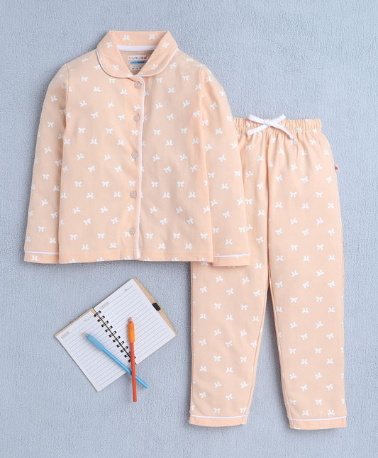 Slip into warmth with Bumzee’s peach pyjama set—drawstring waist and front button top!
