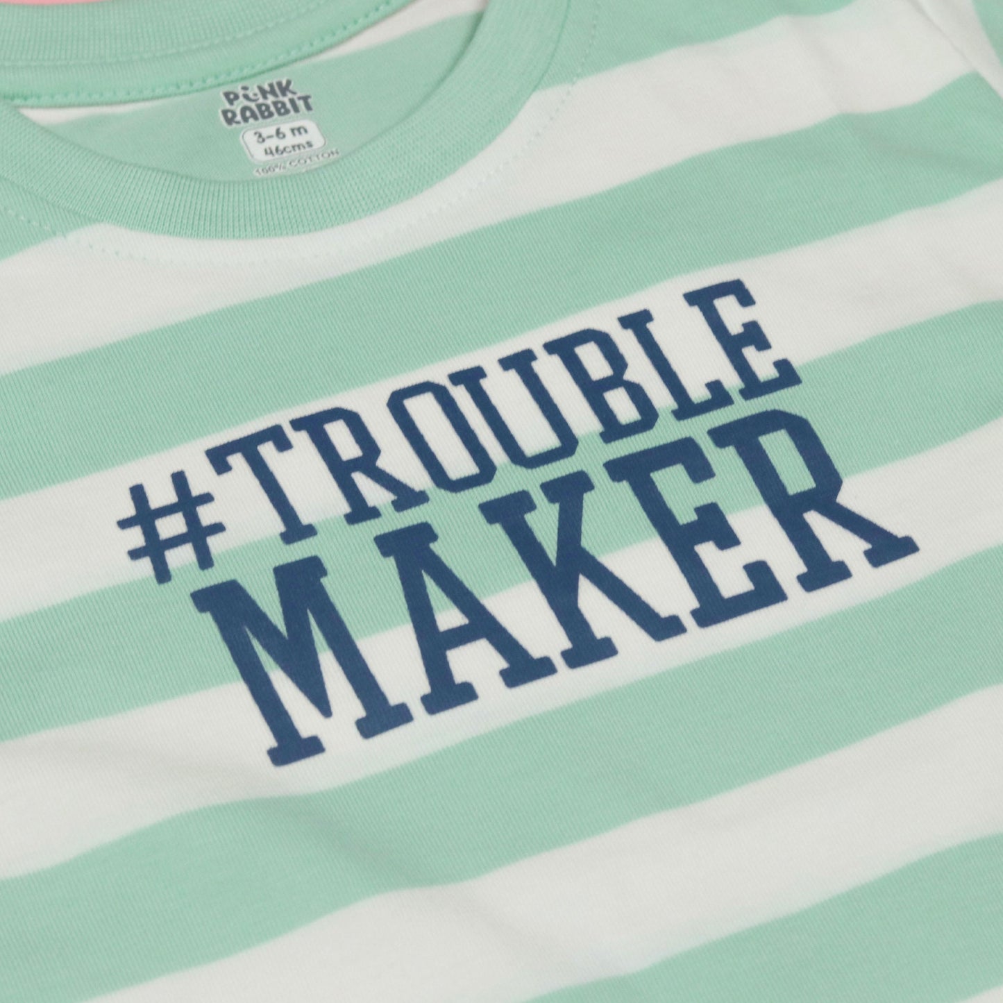 Pink Rabbit Light Green Cotton Tee – Cap Sleeve, Humorous “#TROUBLE MAKER”