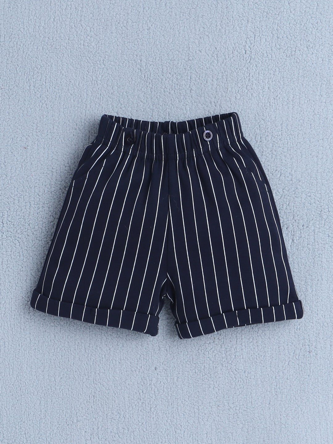 Bumzee’s boys’ festive set: half-sleeve polo, elastic shorts, and cap with cute bow accents!