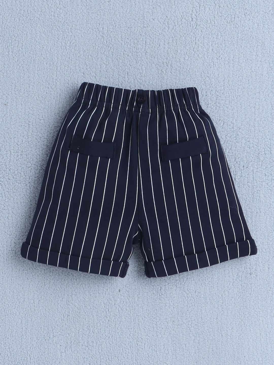 Bumzee’s boys’ festive set: half-sleeve polo, elastic shorts, and cap with cute bow accents!