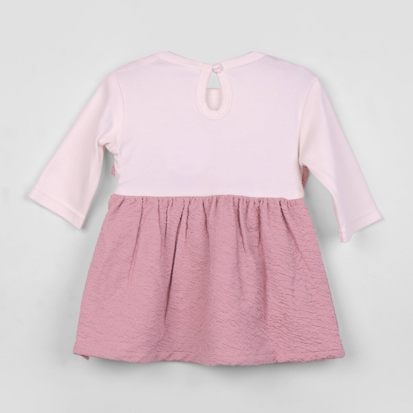 Stay cozy and chic in Kidzhive’s lilac frock—perfect for smart outdoor and festive fun!