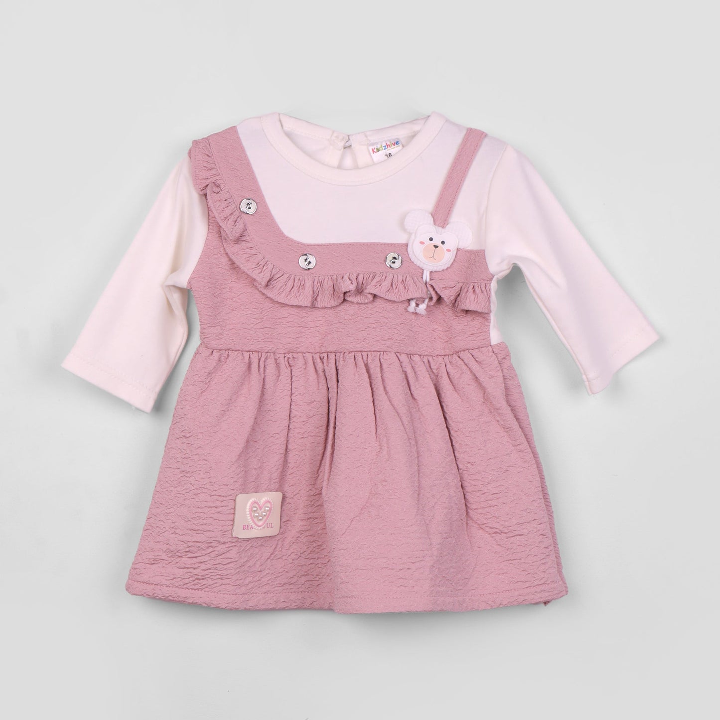 Stay cozy and chic in Kidzhive’s lilac frock—perfect for smart outdoor and festive fun!